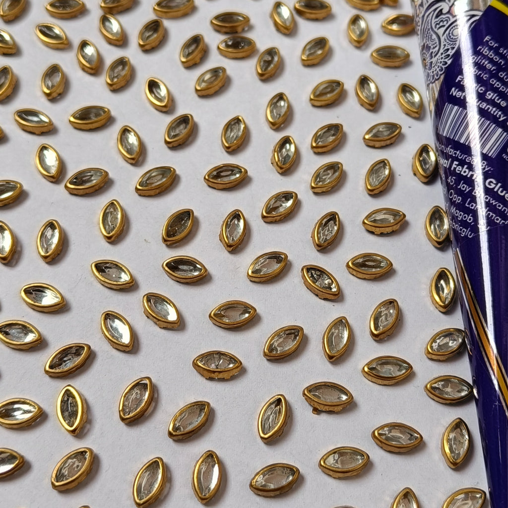 VDEAL BEADS kashti shaped kundan pack of 650 pcs size = 4x8 mm with fabric glue