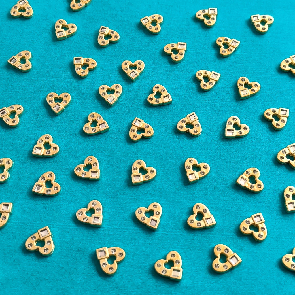 VDEAL BEADS 300pcs of 10mm golden heart shaped motifs with glue